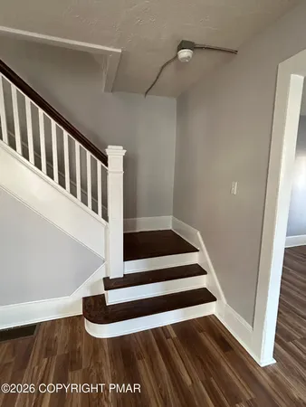 a view of entryway with stairs