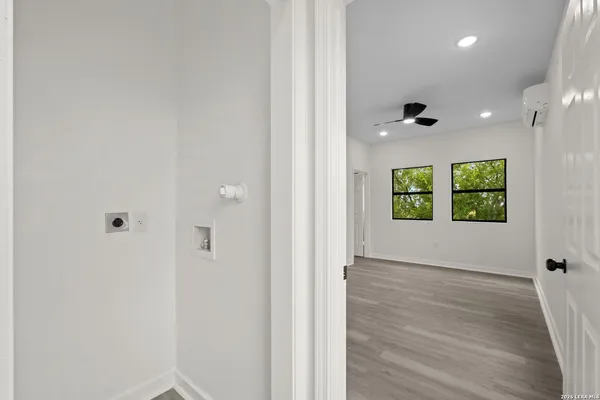 a view of an empty room and window