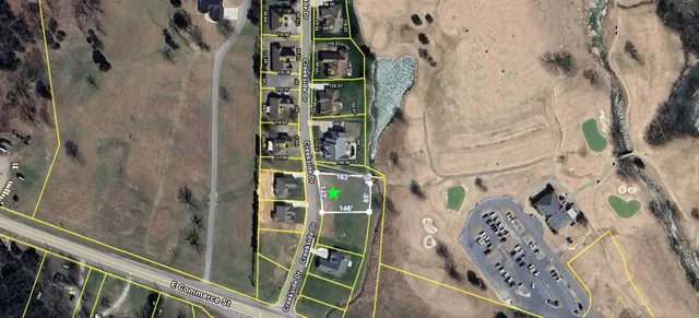 a view of a sink and a yard in the back