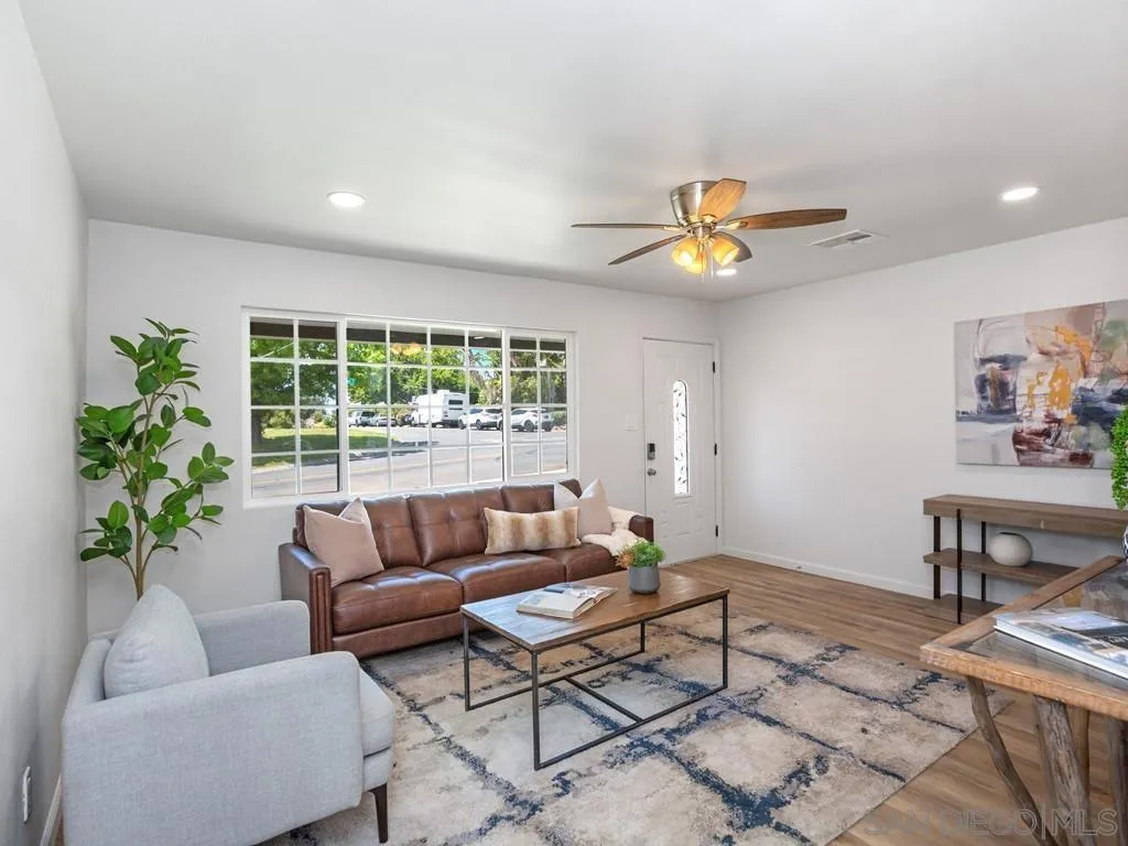 4765 Maple Avenue La Mesa, CA 91942 - Photo 4 of 26 a living room with furniture and a potted plant
