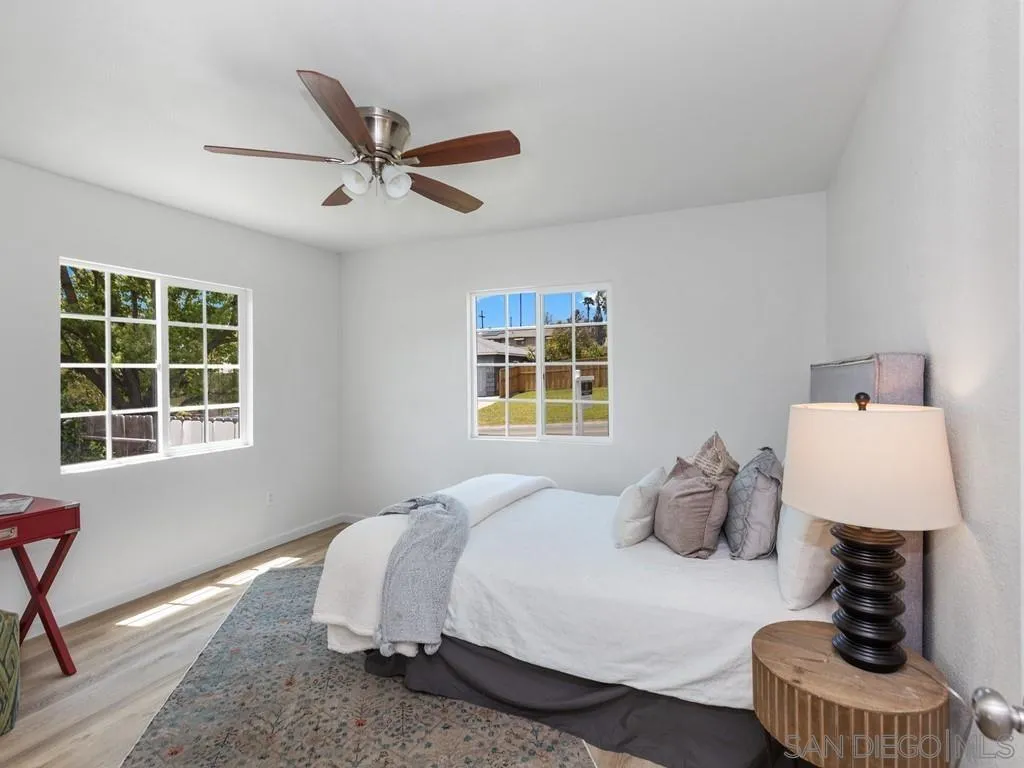 4765 Maple Avenue La Mesa, CA 91942 - Photo 9 of 26 a bedroom with a bed and window