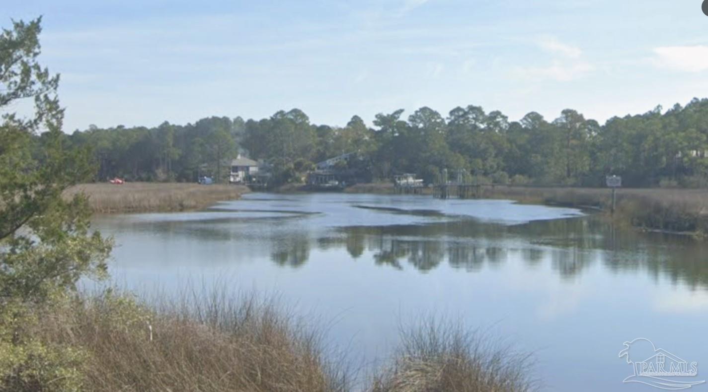 5599 Del Rey Street Milton, FL 32583 - Photo 8 of 25 a view of lake with green space