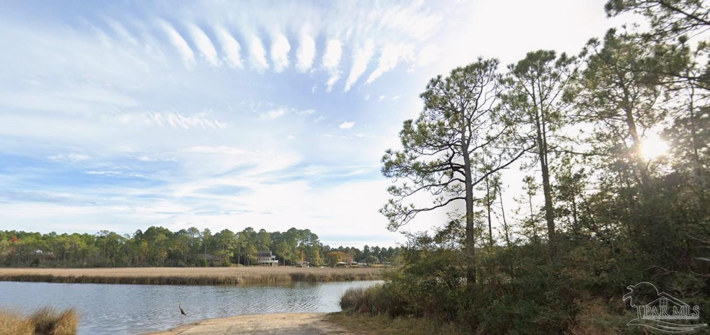 5599 Del Rey Street Milton, FL 32583 - Photo 9 of 25 a view of lake with green space