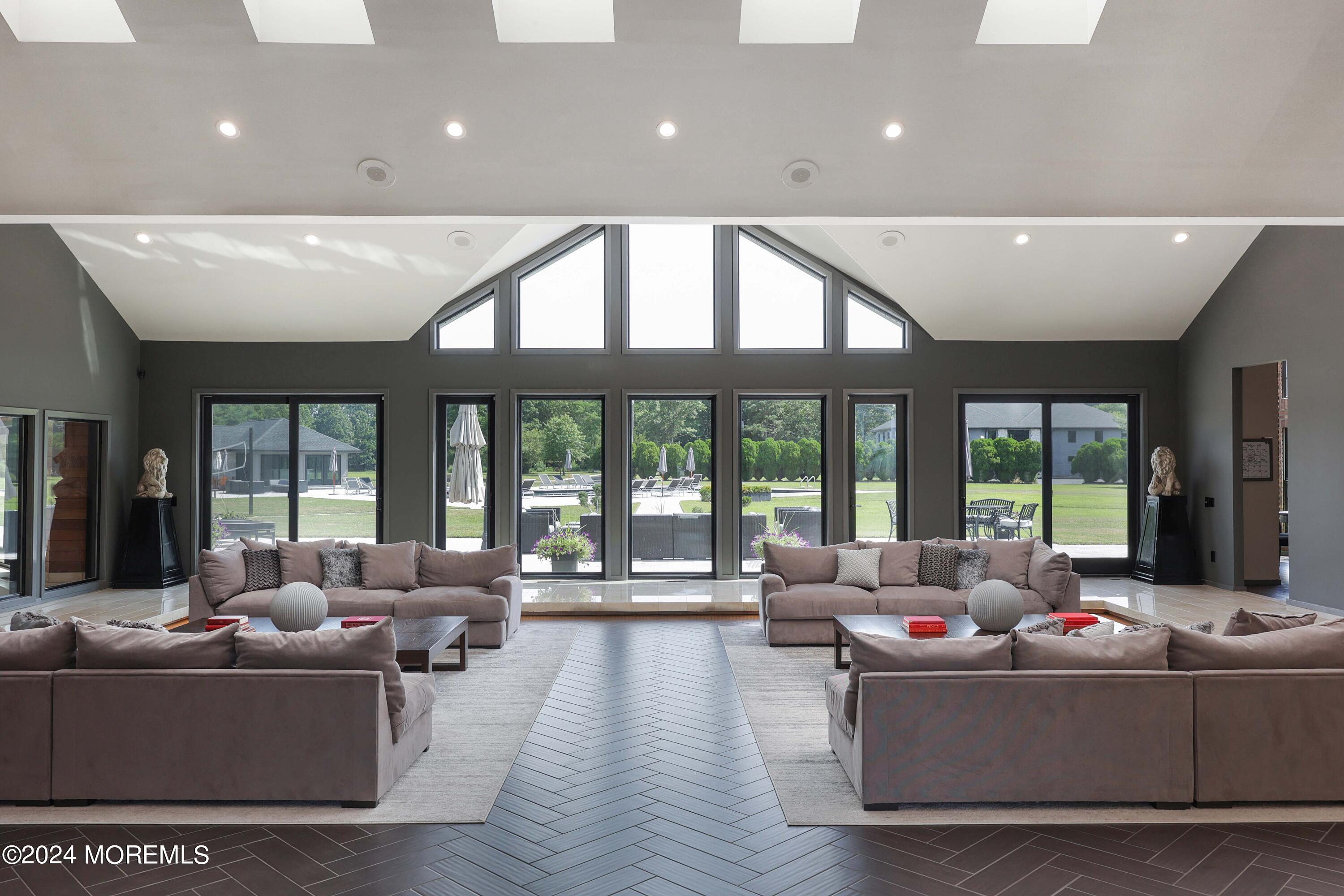 1980 Campbell Road Wall, NJ 07719 - Photo 18 of 110 a living room with furniture and a large window with outer view