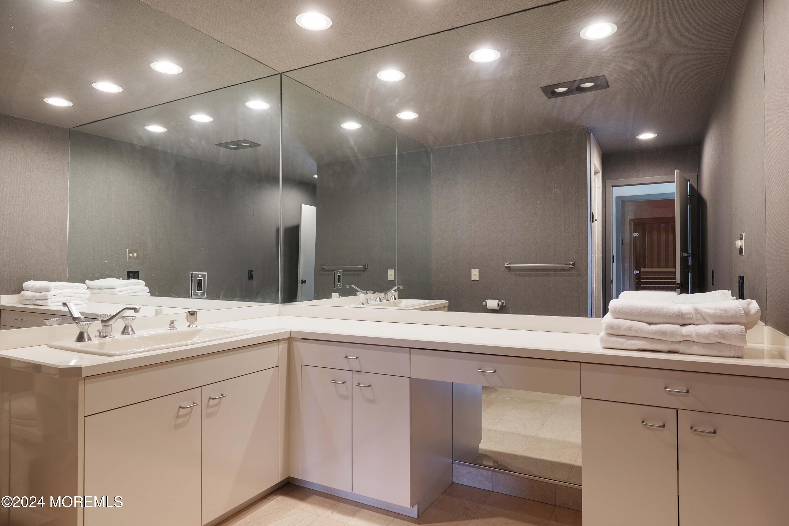 1980 Campbell Road Wall, NJ 07719 - Photo 26 of 110 a bathroom with a sink vanity granite and a mirror