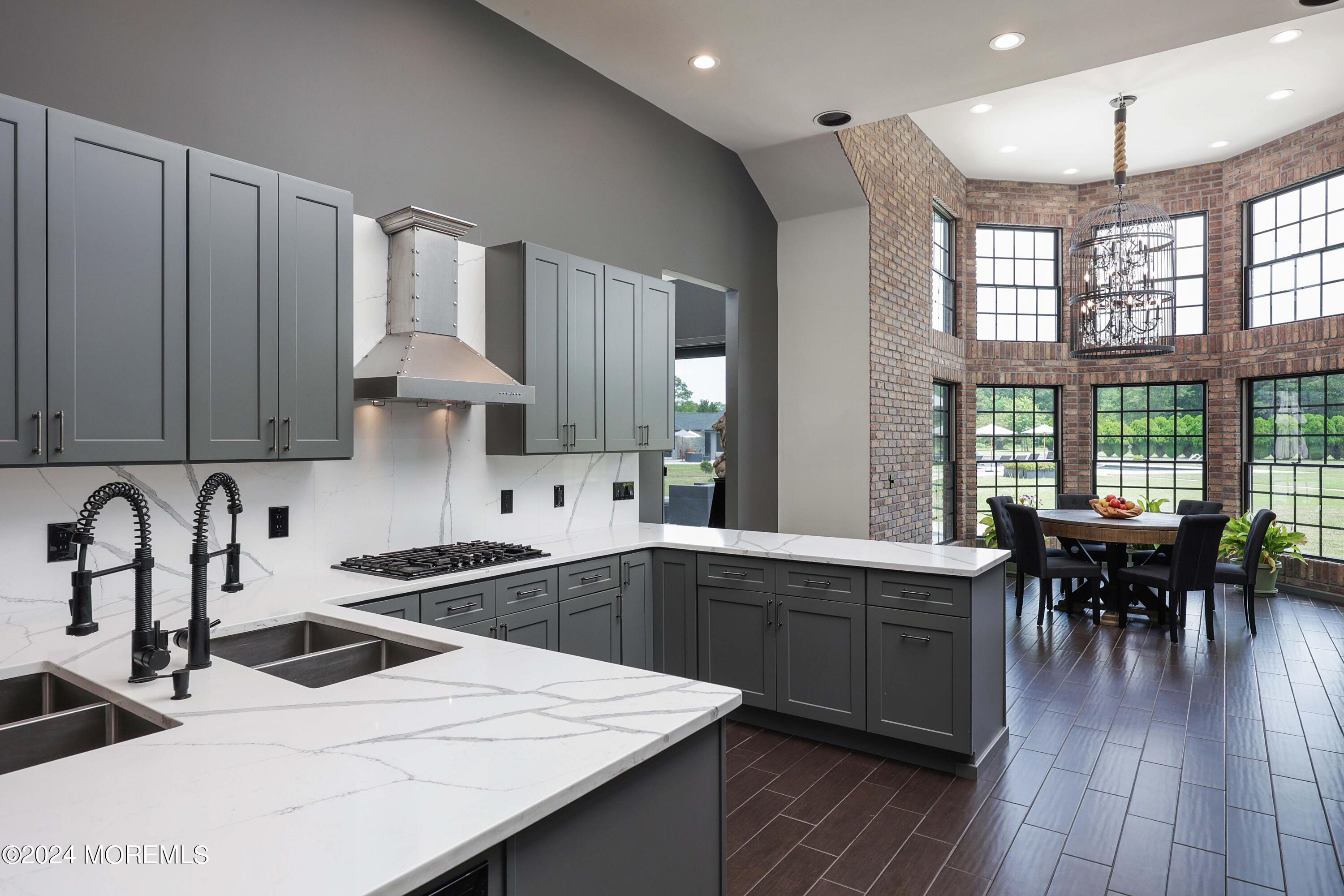 1980 Campbell Road Wall, NJ 07719 - Photo 35 of 110 a kitchen with stainless steel appliances granite countertop a sink a stove a refrigerator and wooden cabinets