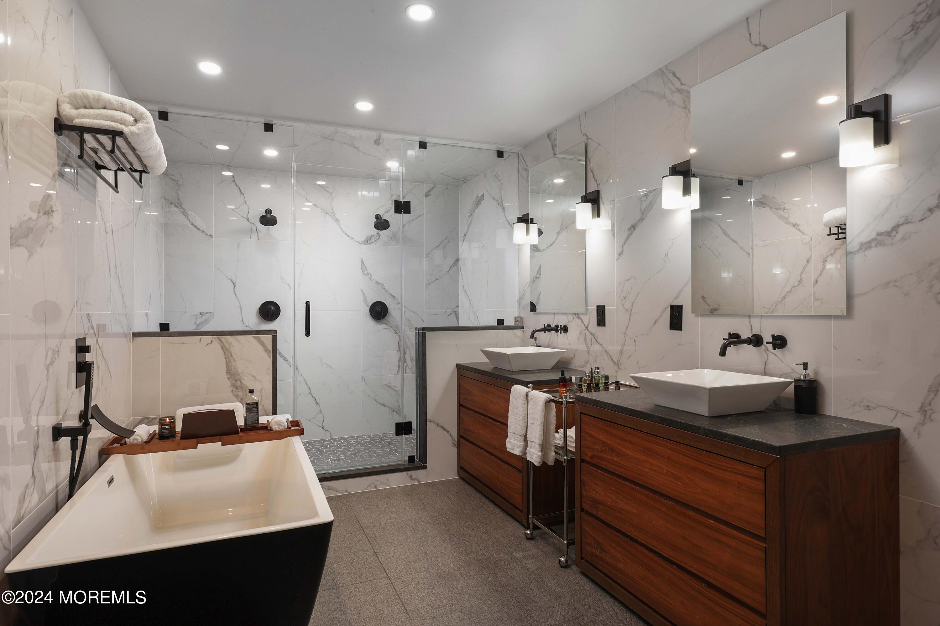 1980 Campbell Road Wall, NJ 07719 - Photo 50 of 110 a bathroom with double vanity and a mirror