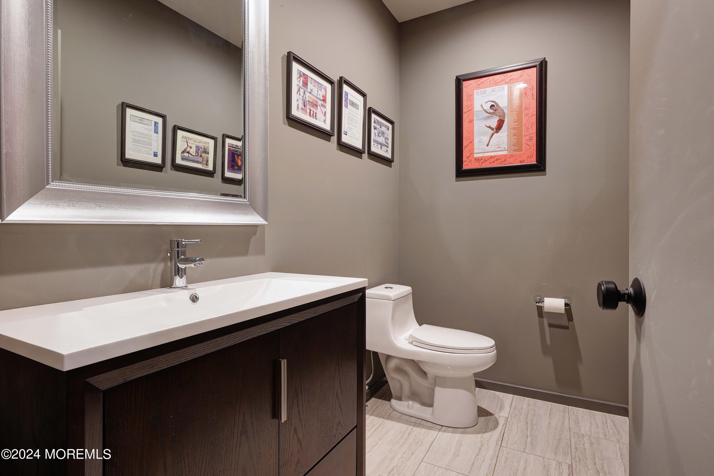 1980 Campbell Road Wall, NJ 07719 - Photo 78 of 110 a bathroom with a sink and a toilet