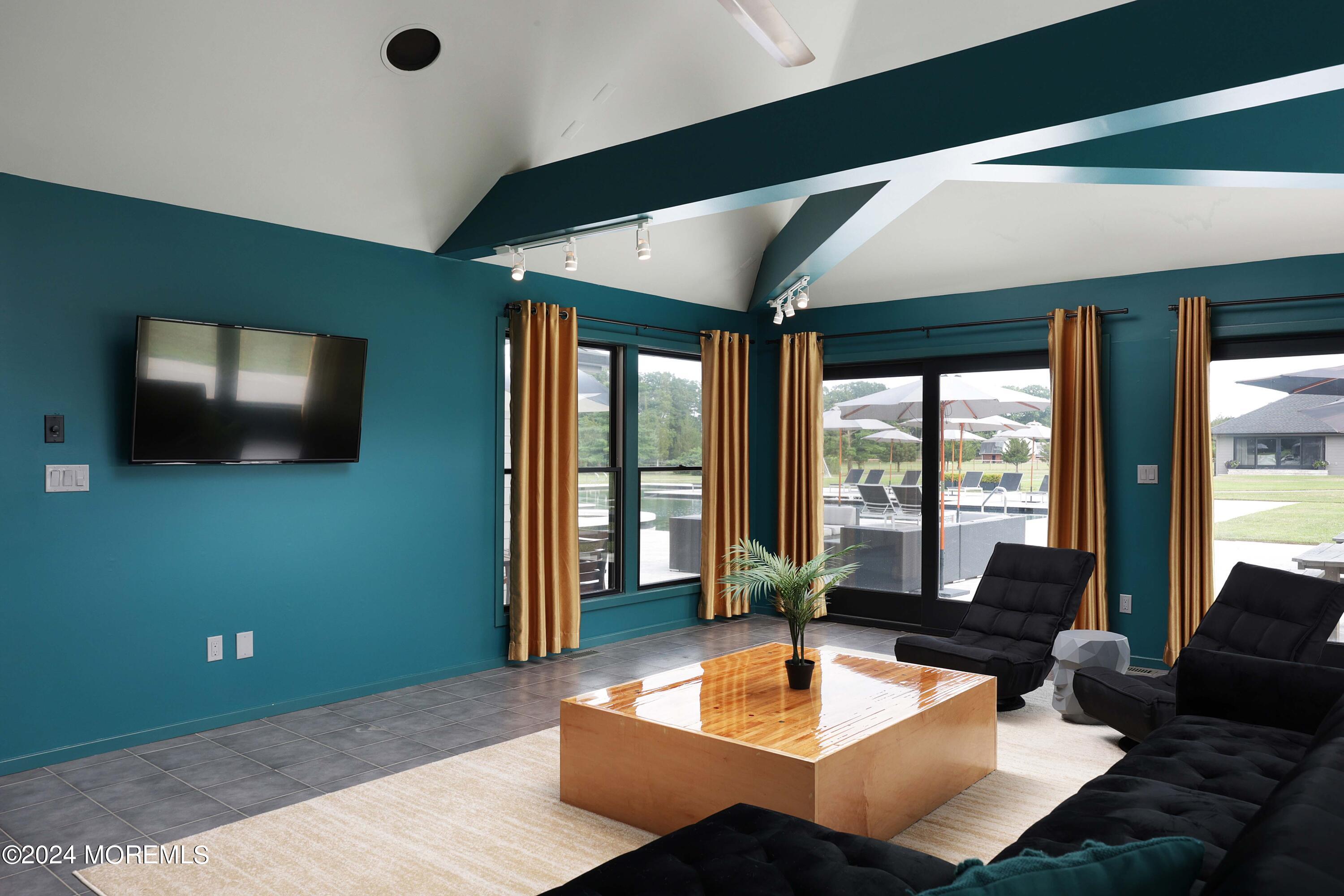 1980 Campbell Road Wall, NJ 07719 - Photo 83 of 110 a living room with furniture and a flat screen tv