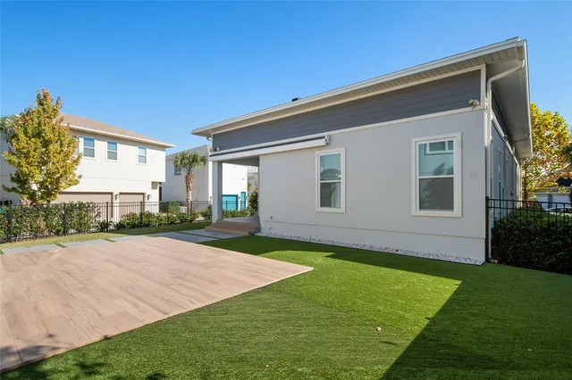 front view of a house with a yard