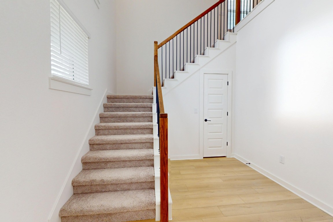 3913 Waxahachie Road Leander, TX 78641 - Photo 15 of 39 a view of an entryway with wooden floor