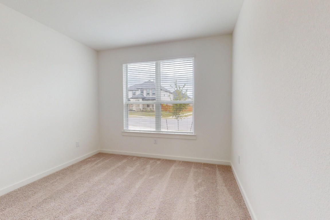 3913 Waxahachie Road Leander, TX 78641 - Photo 24 of 39 an empty room with a window
