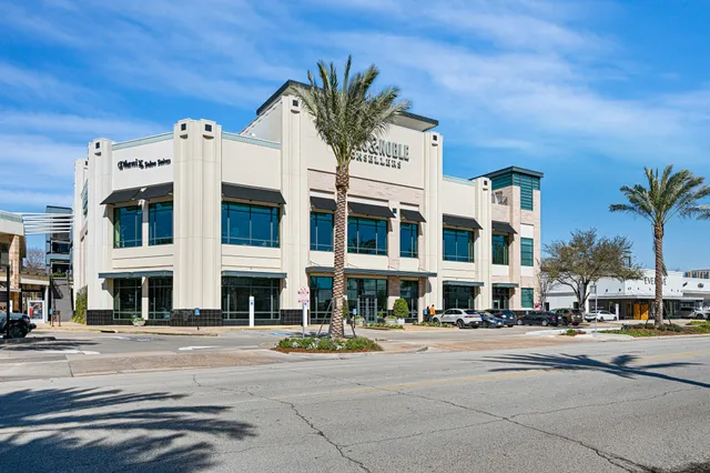 a view of a building with a street