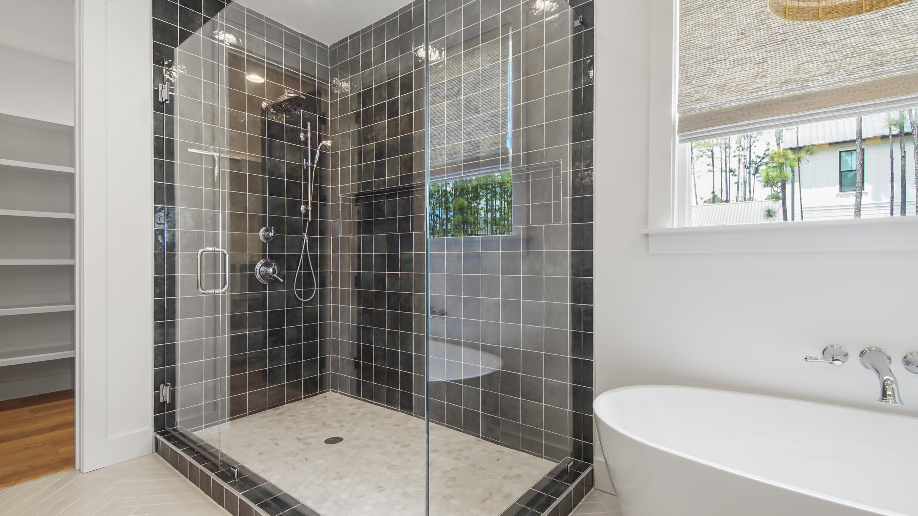 515 Hideaway Circle Santa Rosa Beach, FL 32459 - Photo 23 of 64 a bathroom with a tub and glass door