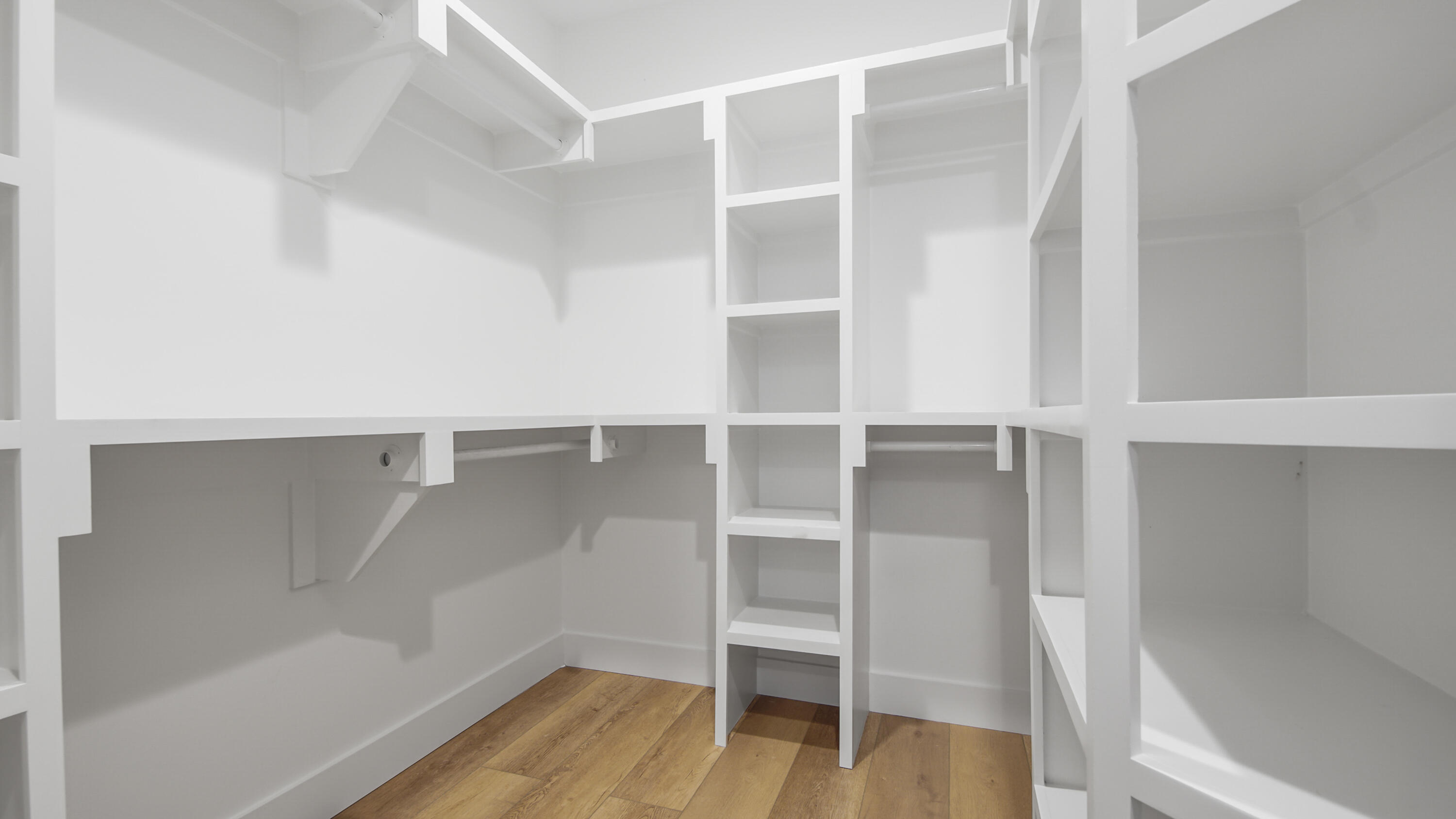 515 Hideaway Circle Santa Rosa Beach, FL 32459 - Photo 28 of 64 a view of walk in closet with empty racks