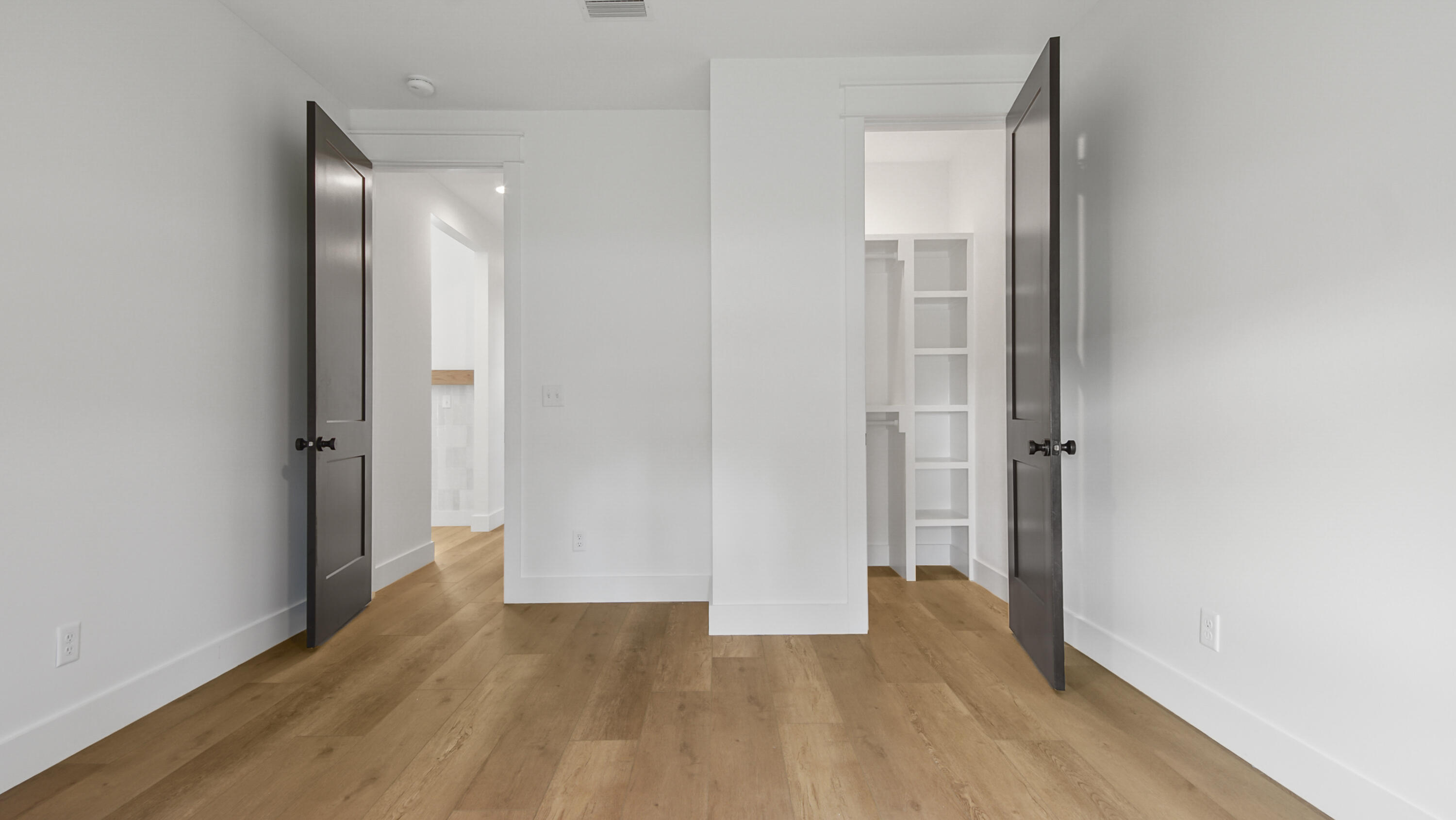 515 Hideaway Circle Santa Rosa Beach, FL 32459 - Photo 33 of 64 a view of hallway with wooden floor