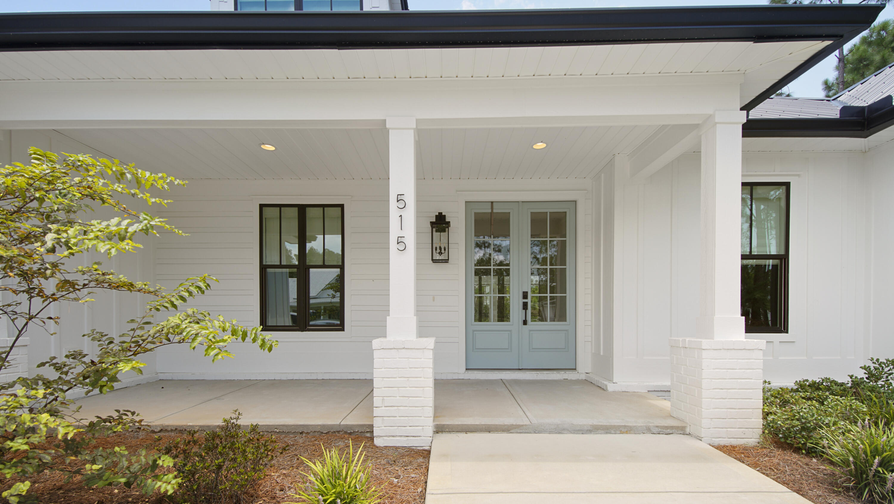 515 Hideaway Circle Santa Rosa Beach, FL 32459 - Photo 4 of 64 a front view of a house with a yard