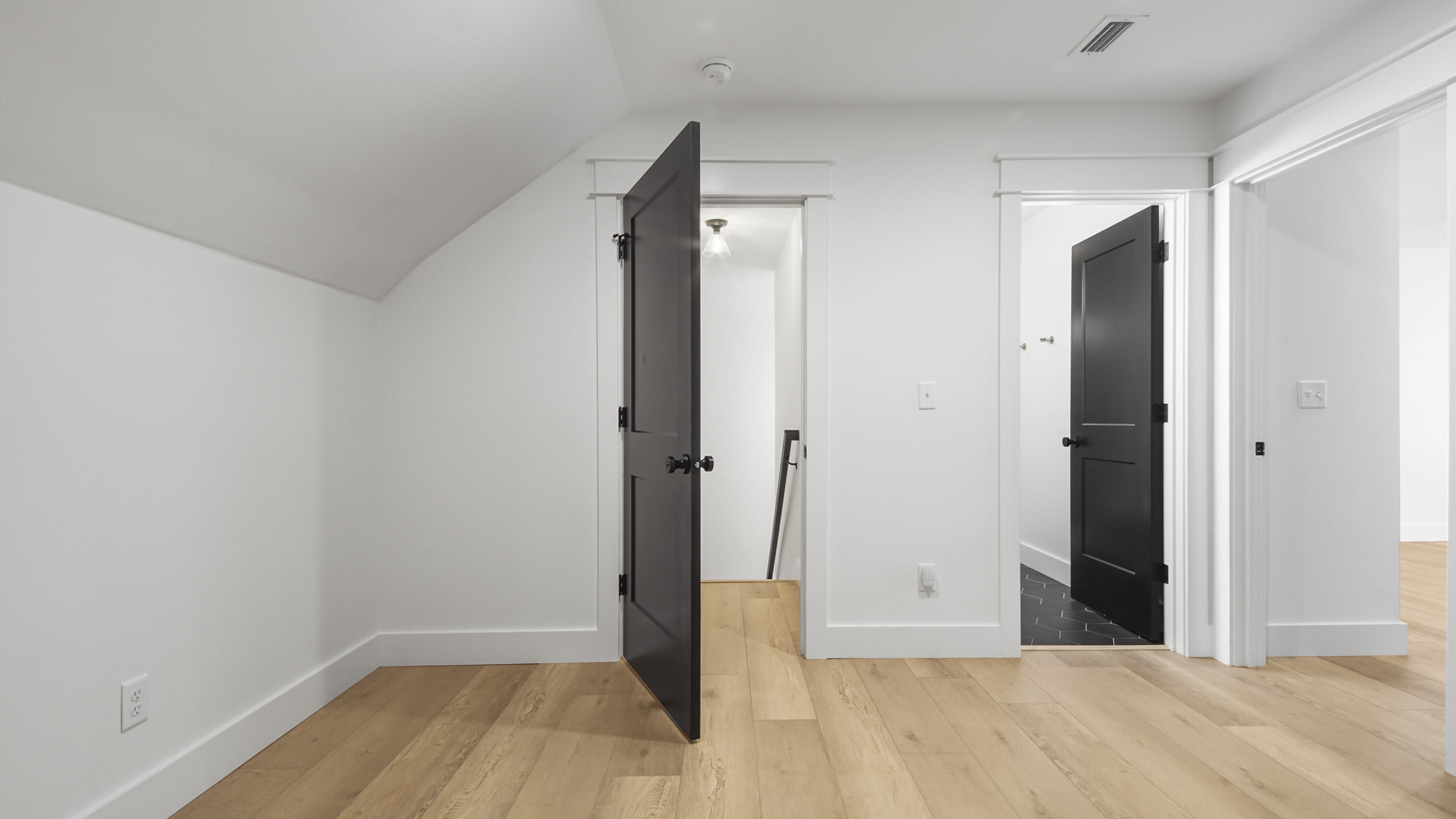 515 Hideaway Circle Santa Rosa Beach, FL 32459 - Photo 48 of 64 a view of a room with wooden floor and a bathroom