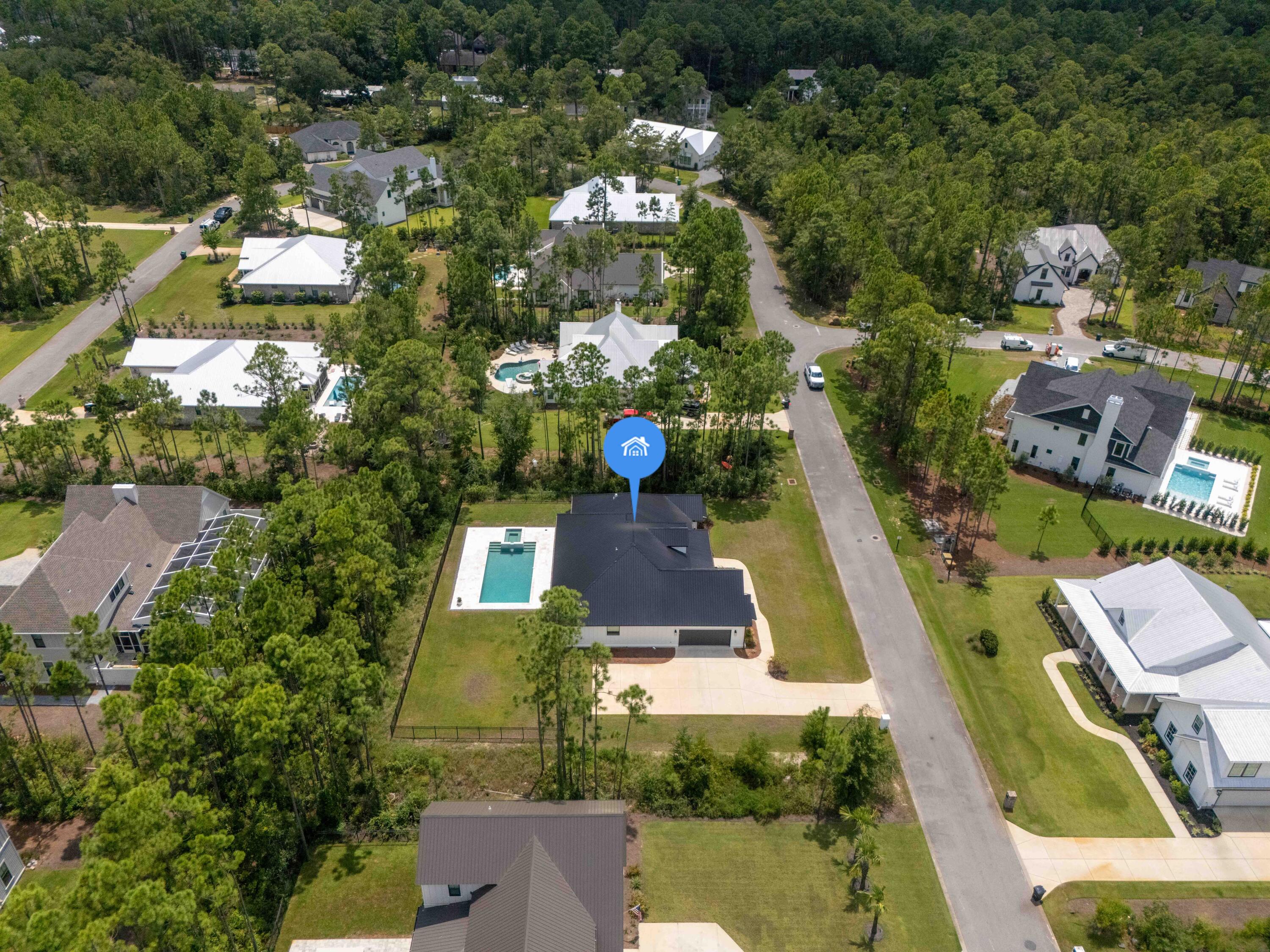 515 Hideaway Circle Santa Rosa Beach, FL 32459 - Photo 63 of 64 an aerial view of a house with a swimming pool