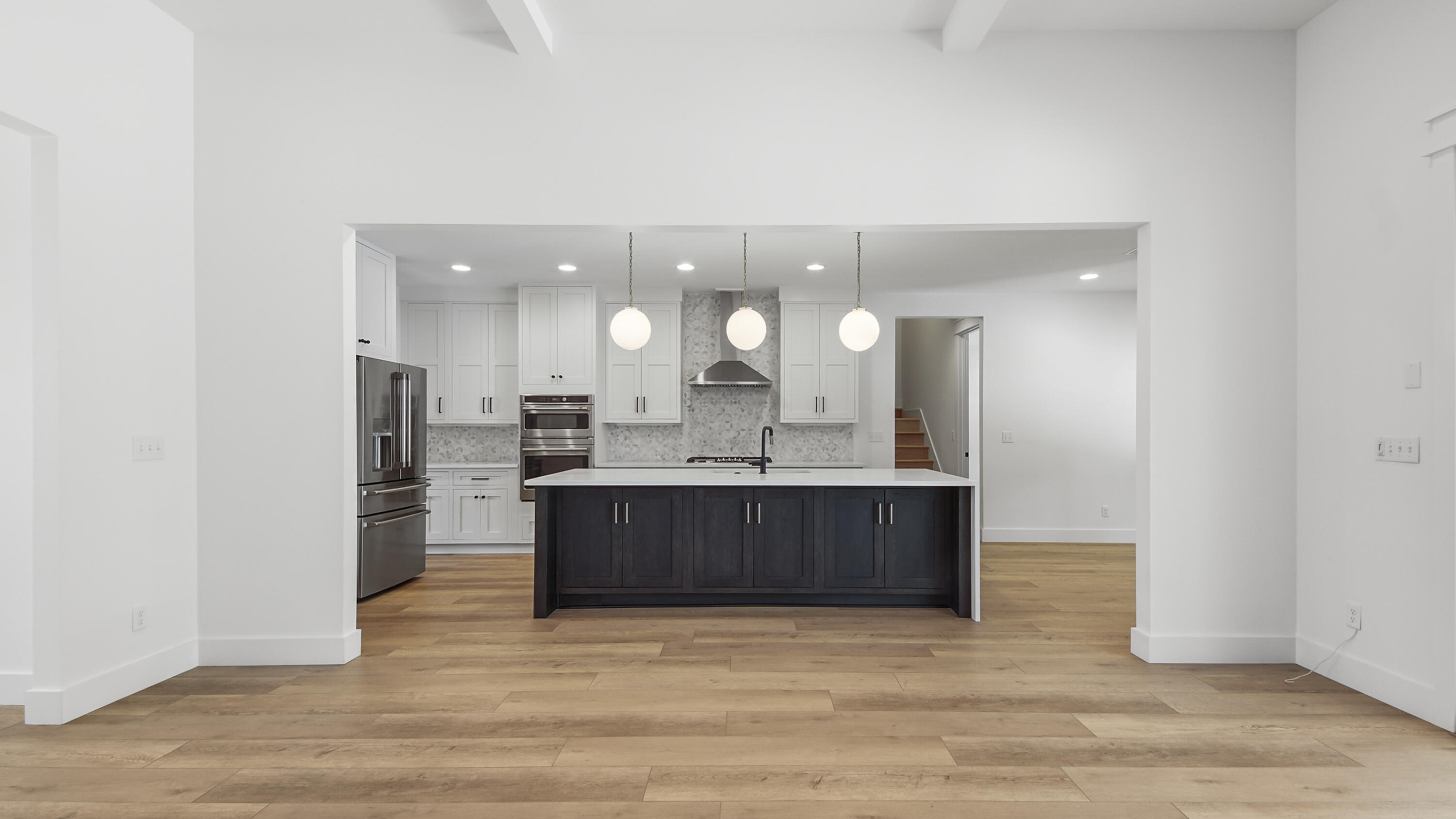 515 Hideaway Circle Santa Rosa Beach, FL 32459 - Photo 64 of 64 a view of a living room kitchen and a wooden floor
