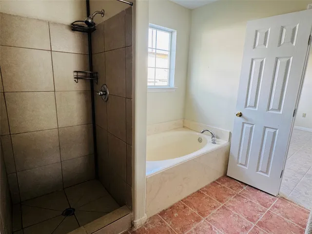 a bathroom with a bathtub