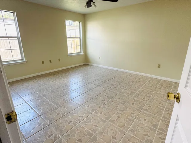 an empty room with windows