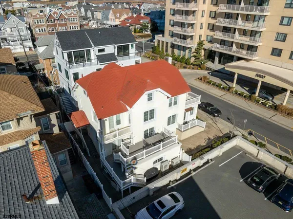 a view of a balcony with wooden floor