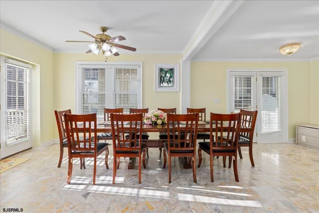 a view of a dining room with furniture