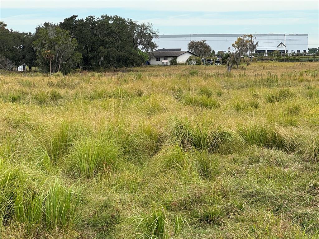0 Cason Road Plant City, FL 33566 - Photo 6 of 11 a view of a lake with houses in the background