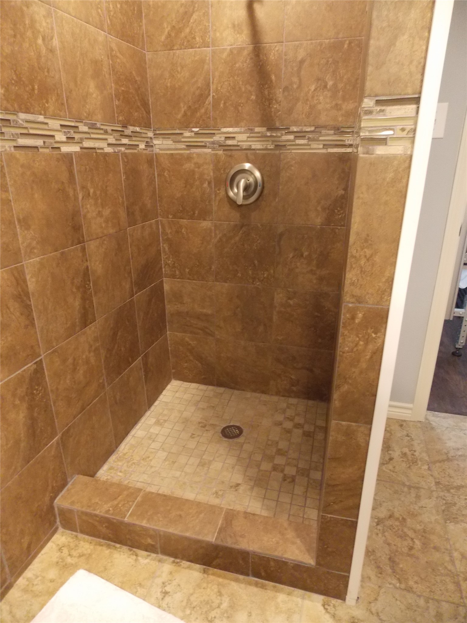 1002 Washington Street Brenham, TX 77833 - Photo 13 of 25 a bathroom with a shower