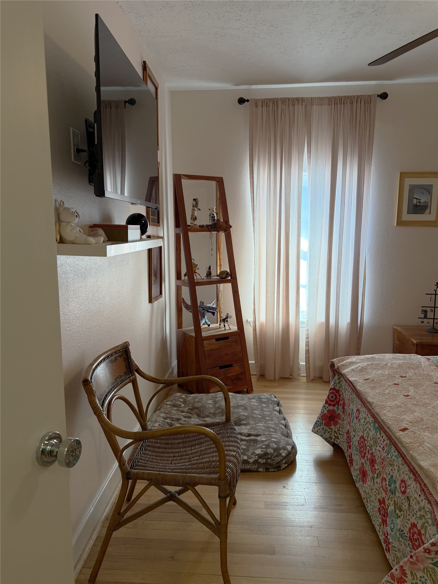 1002 Washington Street Brenham, TX 77833 - Photo 15 of 25 a bedroom with a bed and a window