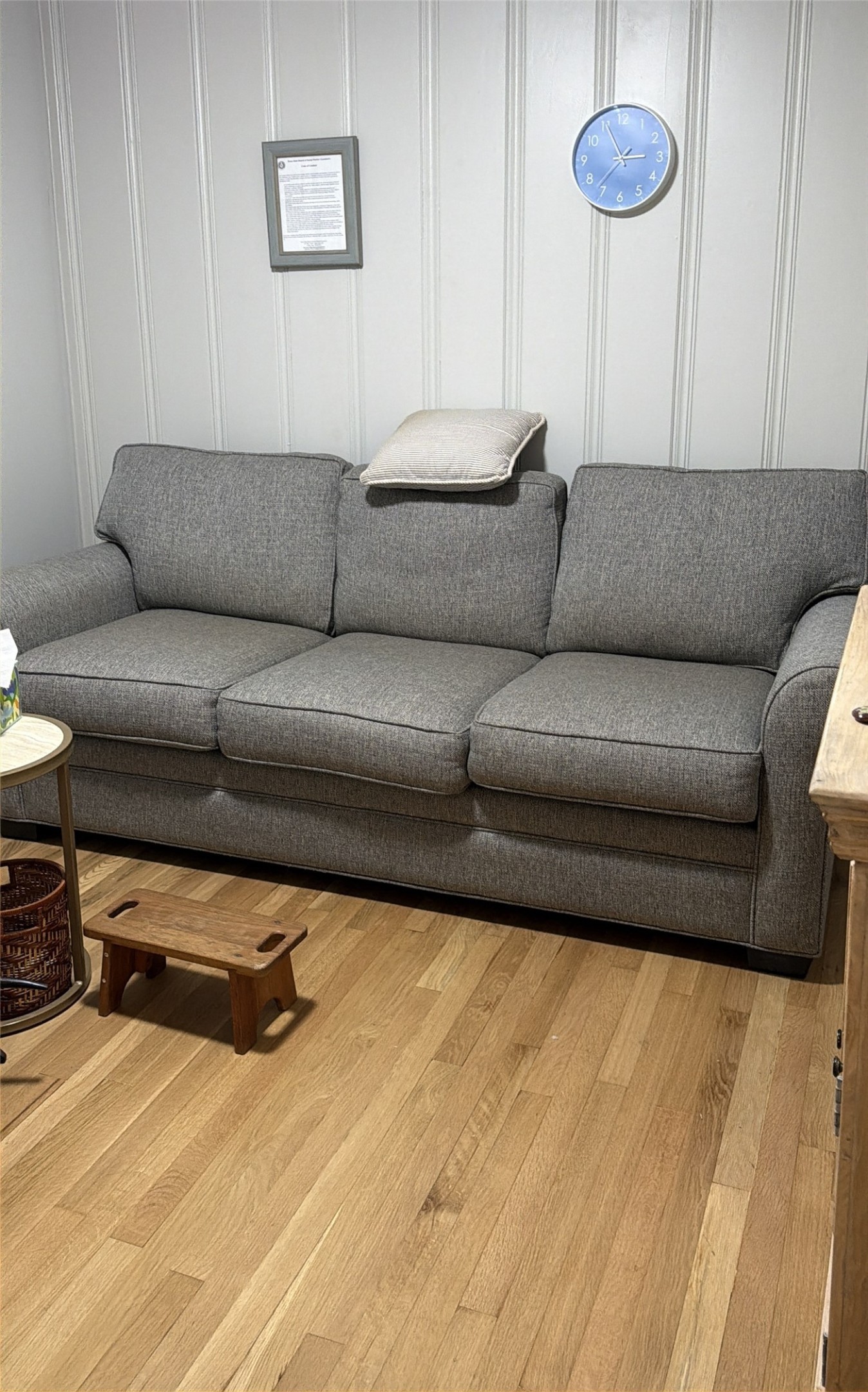 1002 Washington Street Brenham, TX 77833 - Photo 8 of 25 a living room with a couch and a rug