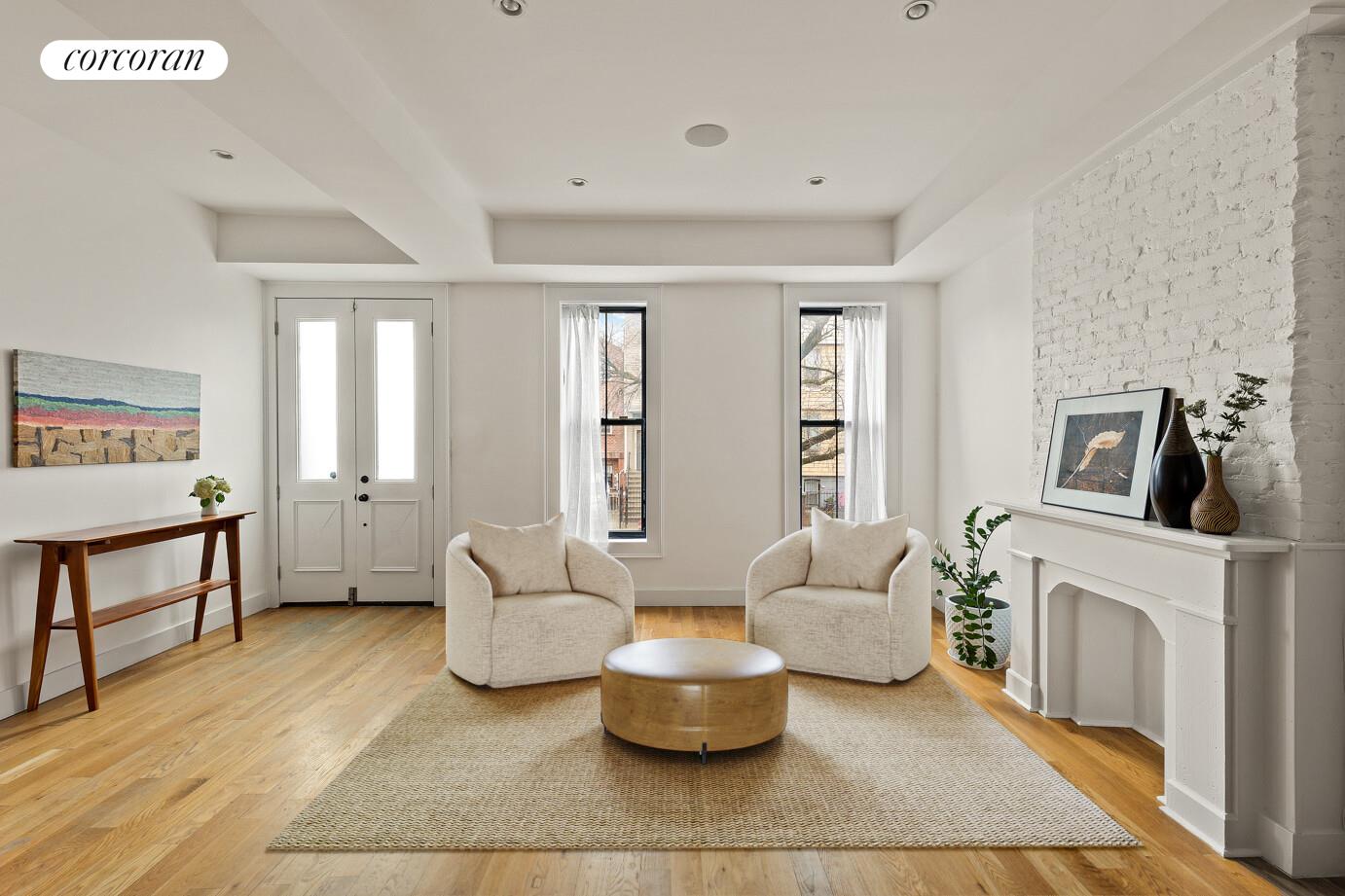 1079 Hancock Street Brooklyn, NY 11221 - Photo 3 of 22 a living room with furniture and a window