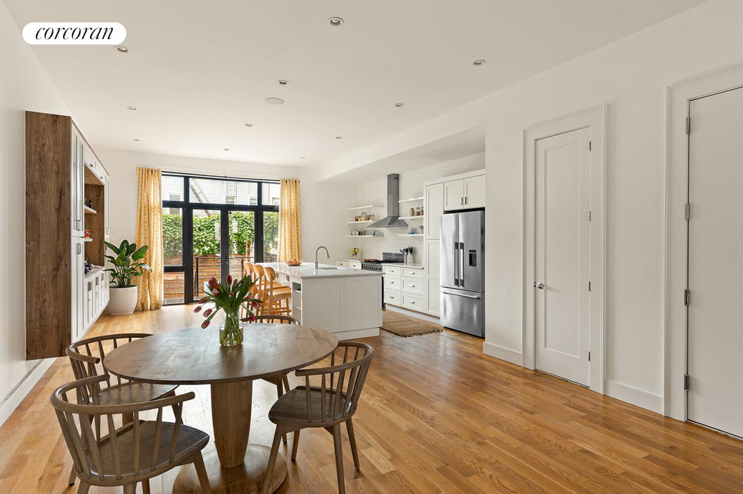 1079 Hancock Street Brooklyn, NY 11221 - Photo 4 of 22 a dining room with furniture and window