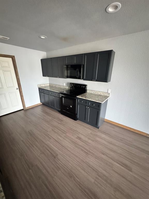 450 Derrs Chapel Road Italy, TX 76651 - Photo 5 of 13 Spacious Kitchen with granite Countertops