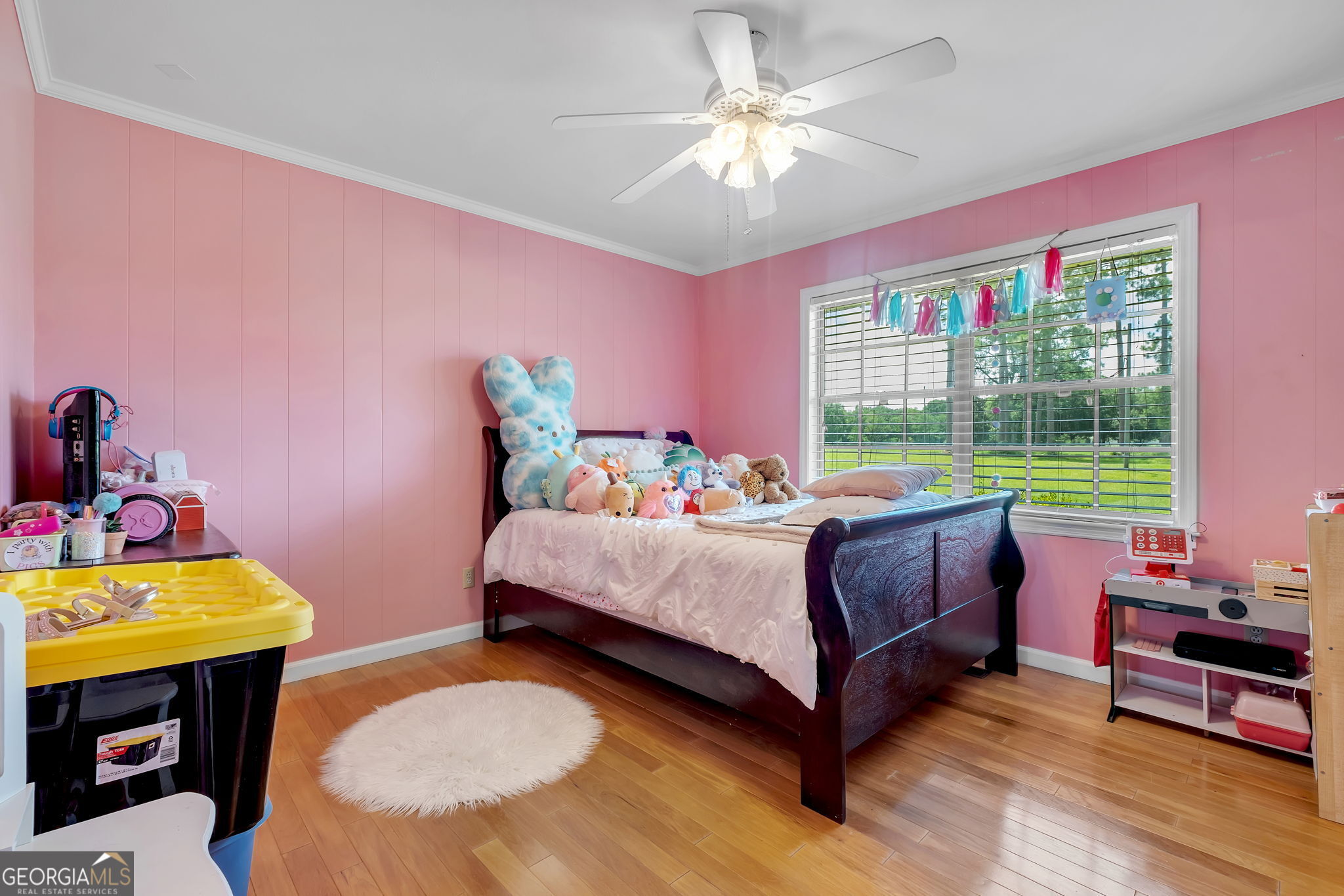 171 Council Lane Cairo, GA 39828 - Photo 15 of 44 a bedroom with a bed table closet and a window