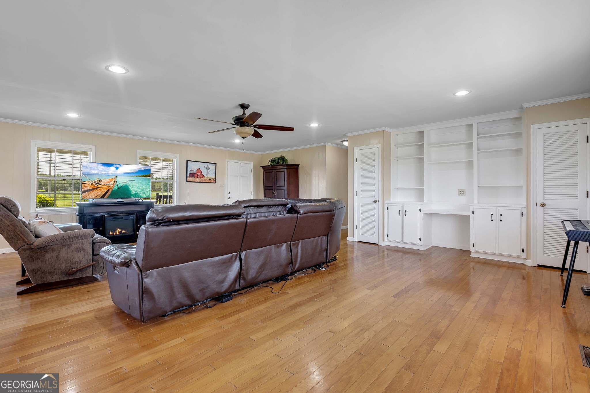 171 Council Lane Cairo, GA 39828 - Photo 19 of 44 a living room with furniture and a wooden floor