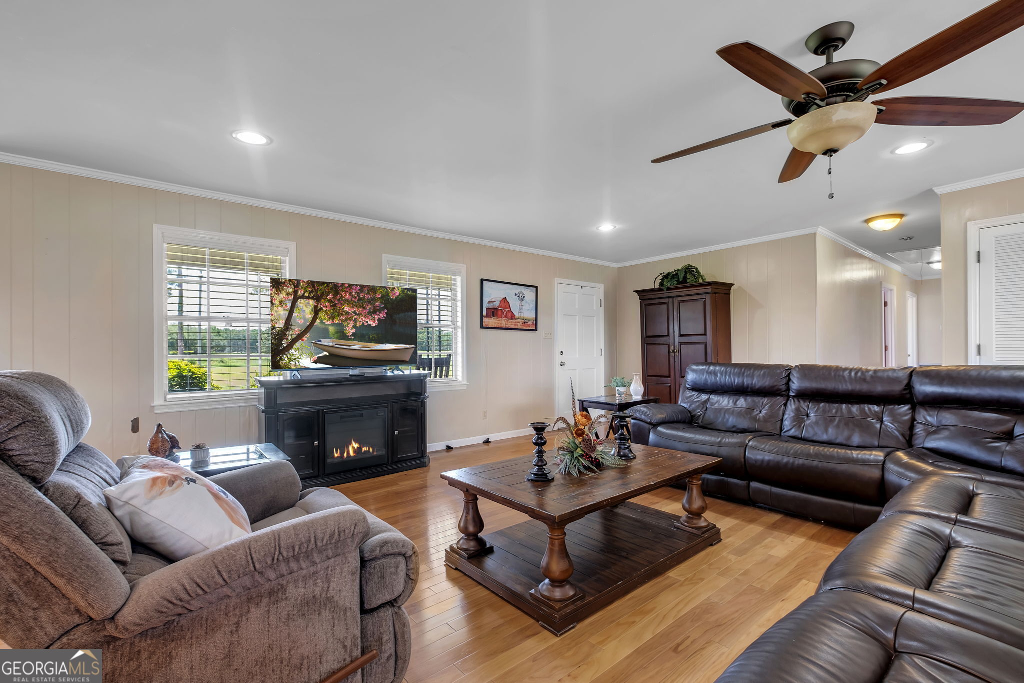 171 Council Lane Cairo, GA 39828 - Photo 20 of 44 a living room with furniture and a fireplace