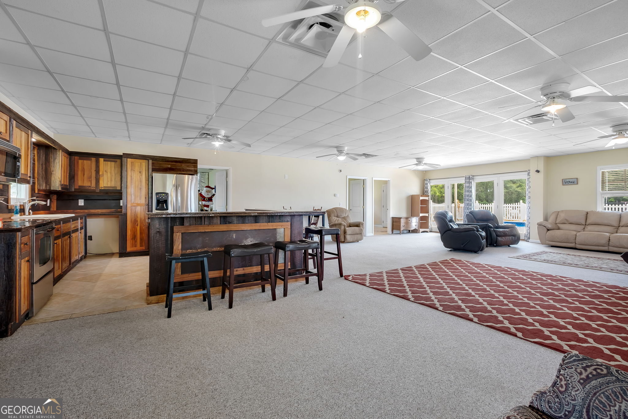 171 Council Lane Cairo, GA 39828 - Photo 32 of 44 a bedroom with furniture and a chandelier