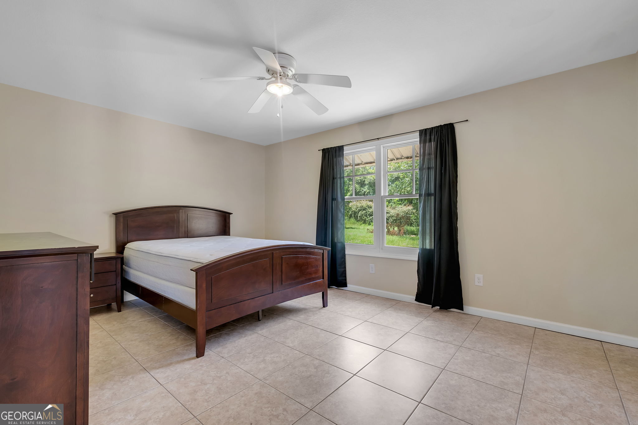 171 Council Lane Cairo, GA 39828 - Photo 36 of 44 a bedroom with a bed and window
