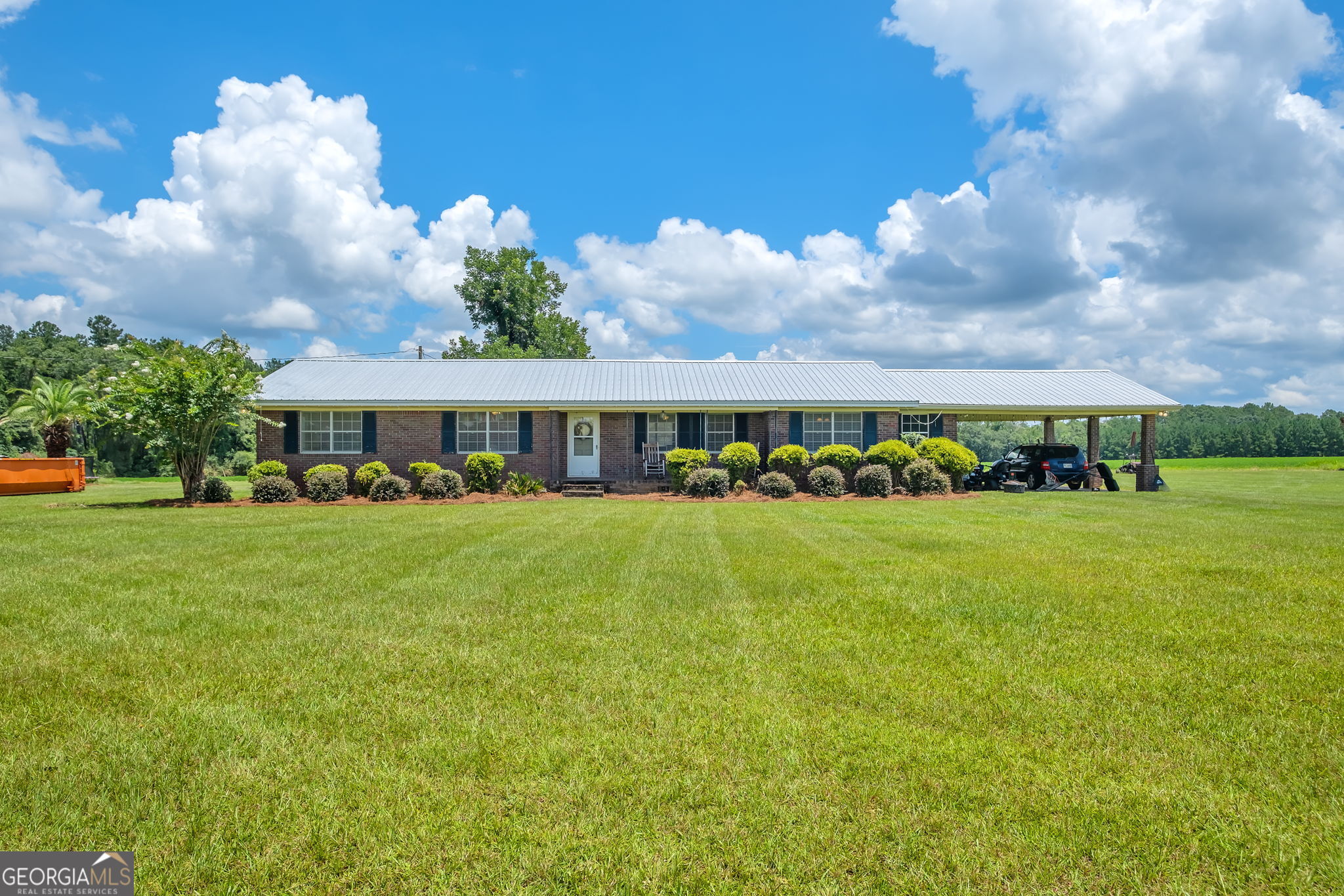 171 Council Lane Cairo, GA 39828 - Photo 40 of 44 a front view of house with an outdoor space and seating