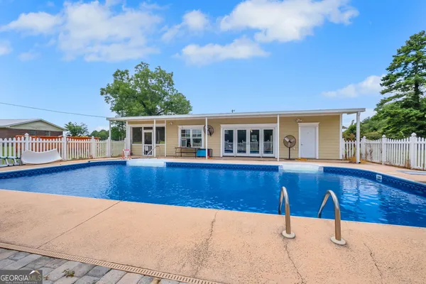 a view of house with outdoor space
