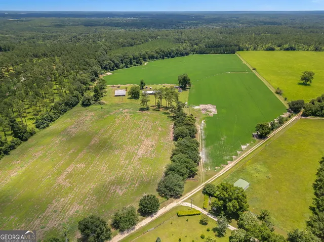 a view of a swimming pool and an outdoor seating