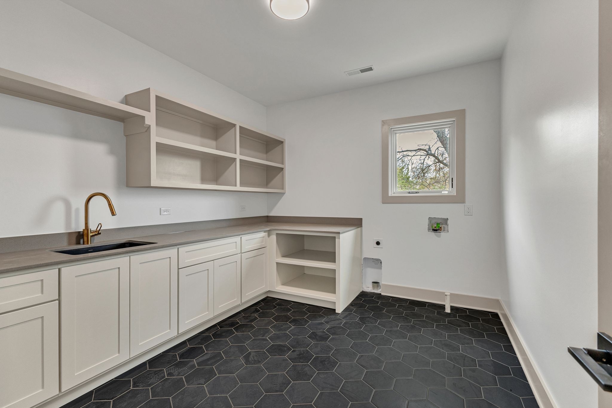 459 Franklin Road Franklin, TN 37069 - Photo 30 of 40 a kitchen with a sink and cabinets