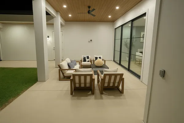 a view of a chairs and tables in patio
