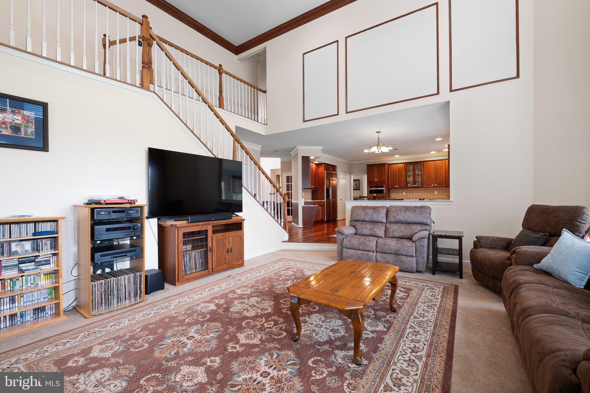 407 Nattull Drive Bear, DE 19701 - Photo 17 of 65 a living room with furniture and a flat screen tv