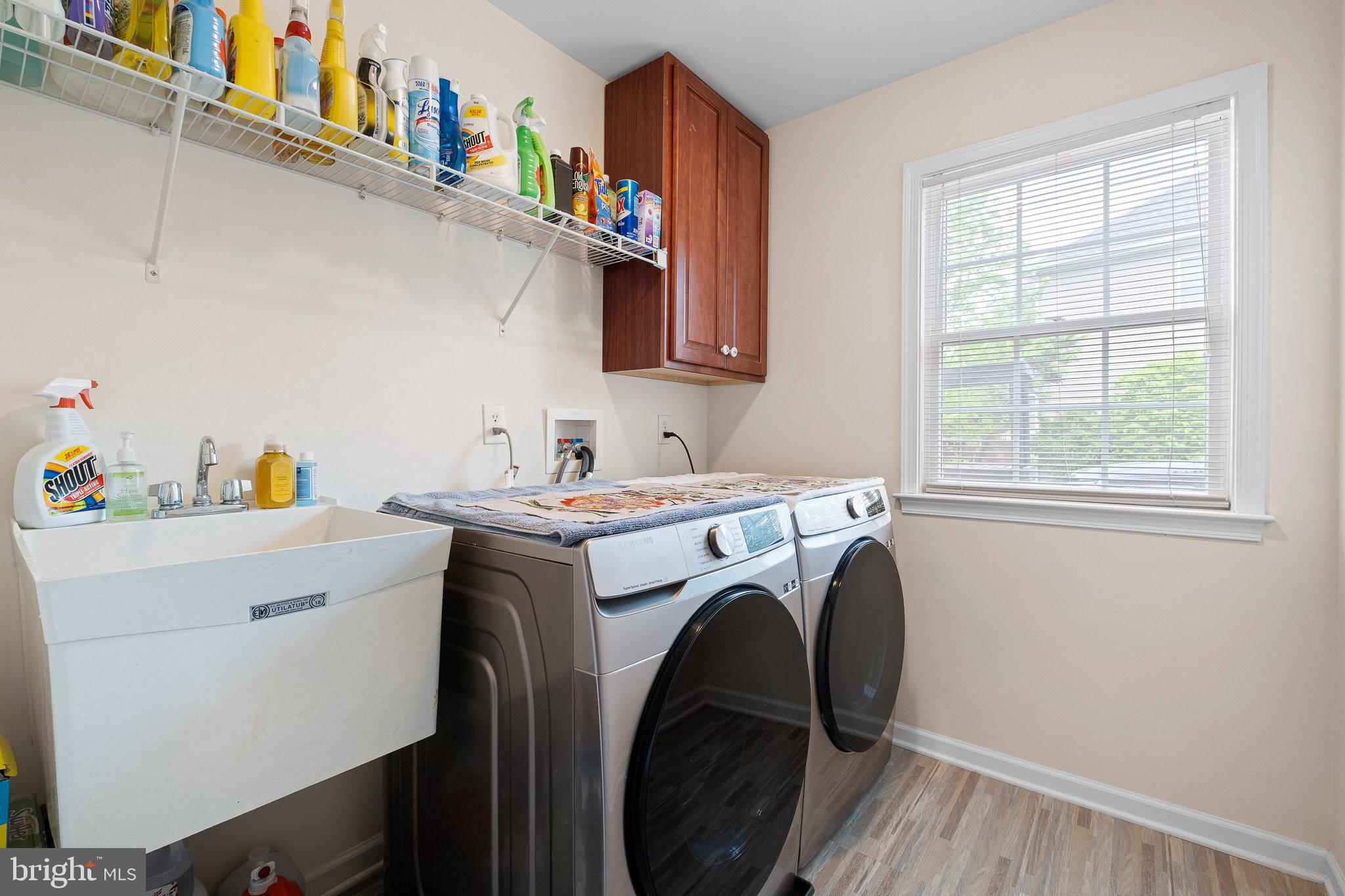 407 Nattull Drive Bear, DE 19701 - Photo 22 of 65 a utility room with dryer and washer