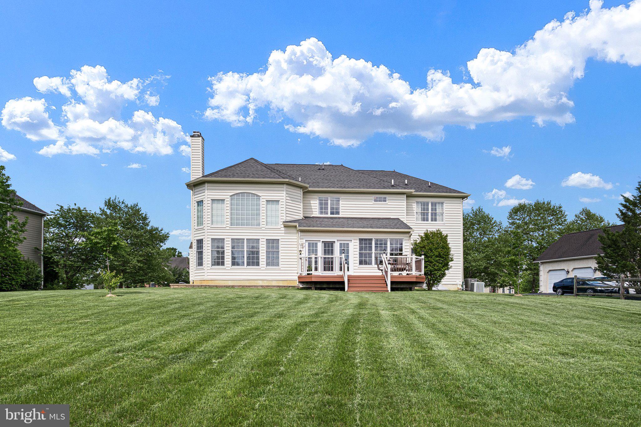 407 Nattull Drive Bear, DE 19701 - Photo 48 of 65 a front view of a house with a garden