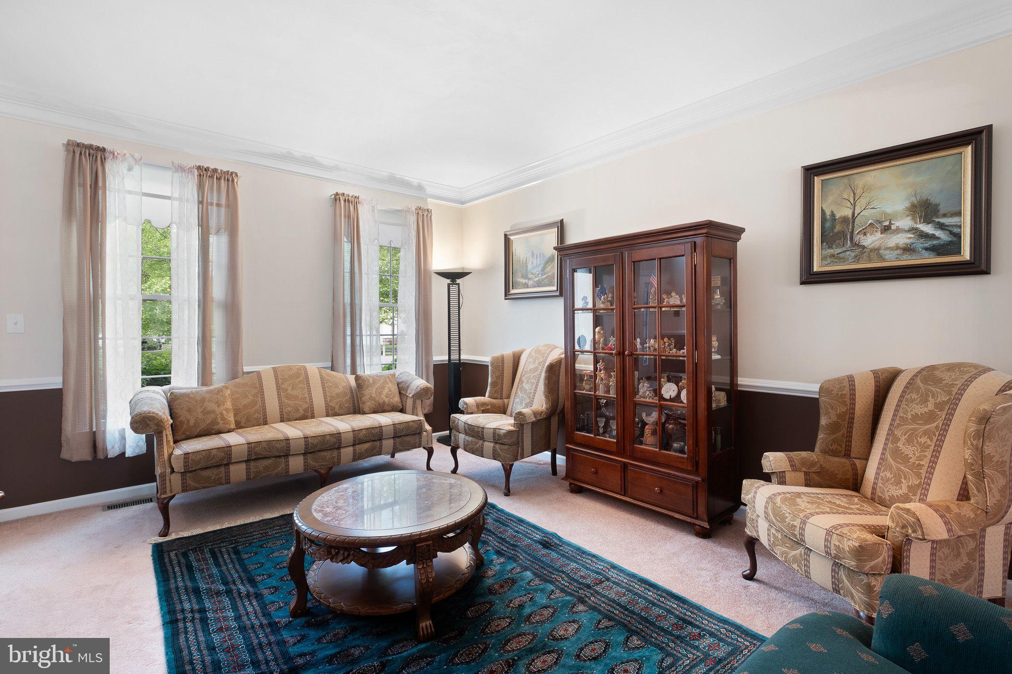 407 Nattull Drive Bear, DE 19701 - Photo 5 of 65 a living room with furniture and a large window