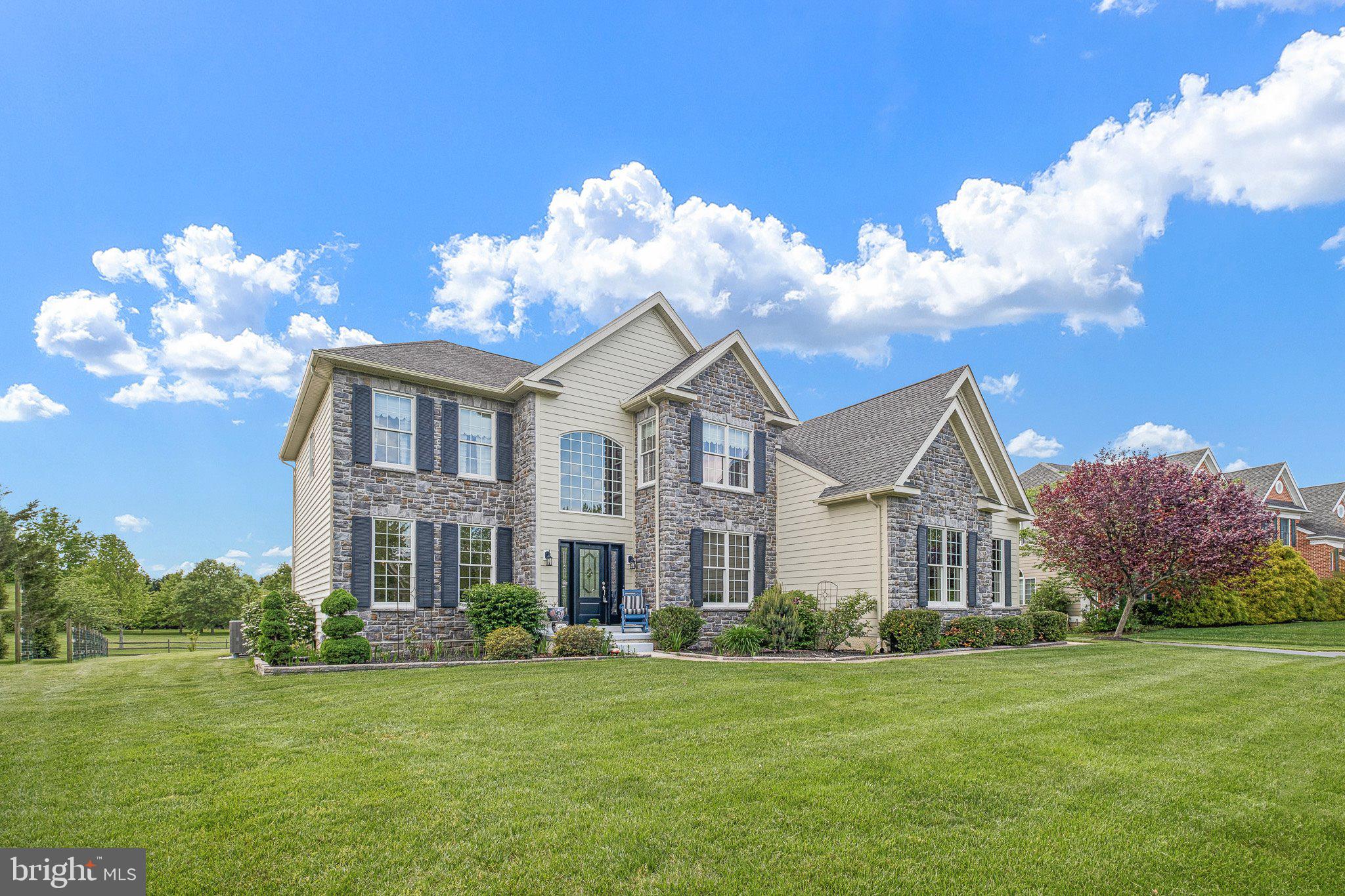 407 Nattull Drive Bear, DE 19701 - Photo 57 of 65 a front view of a house with garden